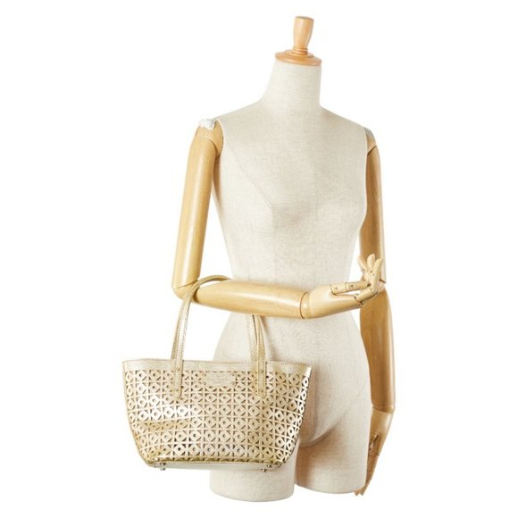 Kate Spade logo punched tote bag, gold leather handbag, women's.